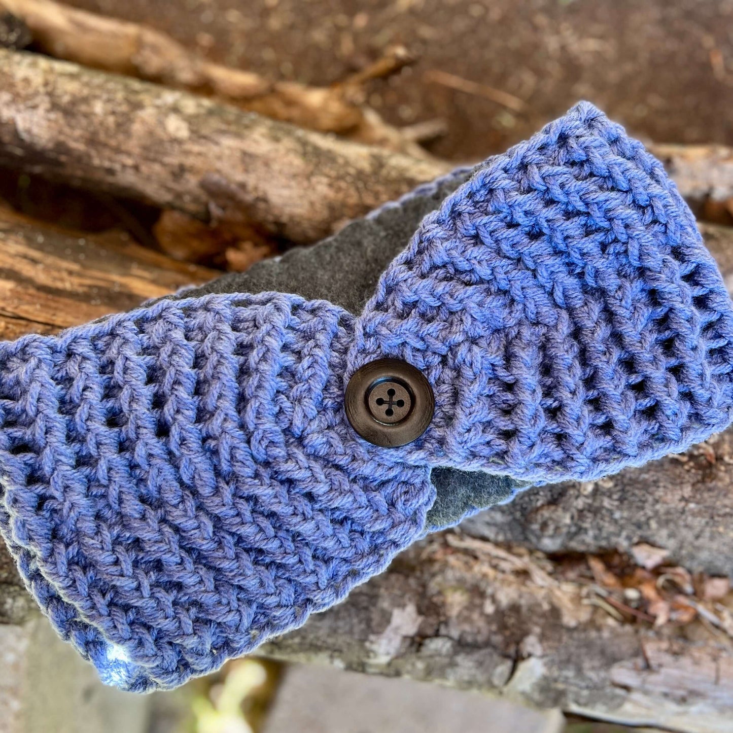 Winter Headband with Fleece Lining and Working Button - Denim BlueKeep your ears nice and warm without messing up your do. Crocheted with super soft acrylic yarn and lined with fleece for extra warmth. Button can be worn in the back, front or on the side.