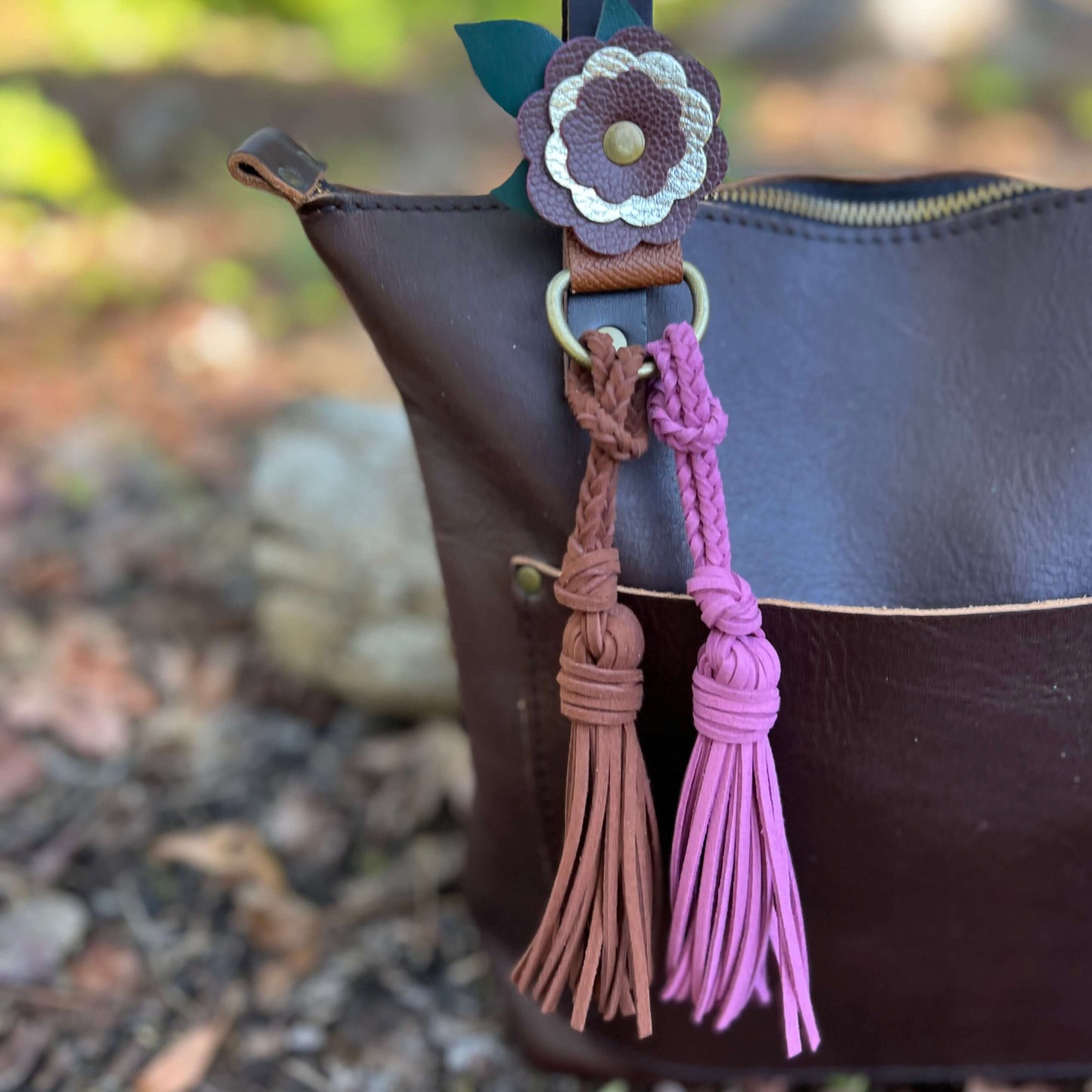 Bag Charm - Mini 4" Tassel for Purses & Totes Faux Suede LeatherJazz up your tote bag, handbag or key chain with a tassel. Lariat style tassels are crafted from faux suede leather so they are stylish and cruelty free. Loop it around your bag strap, purse