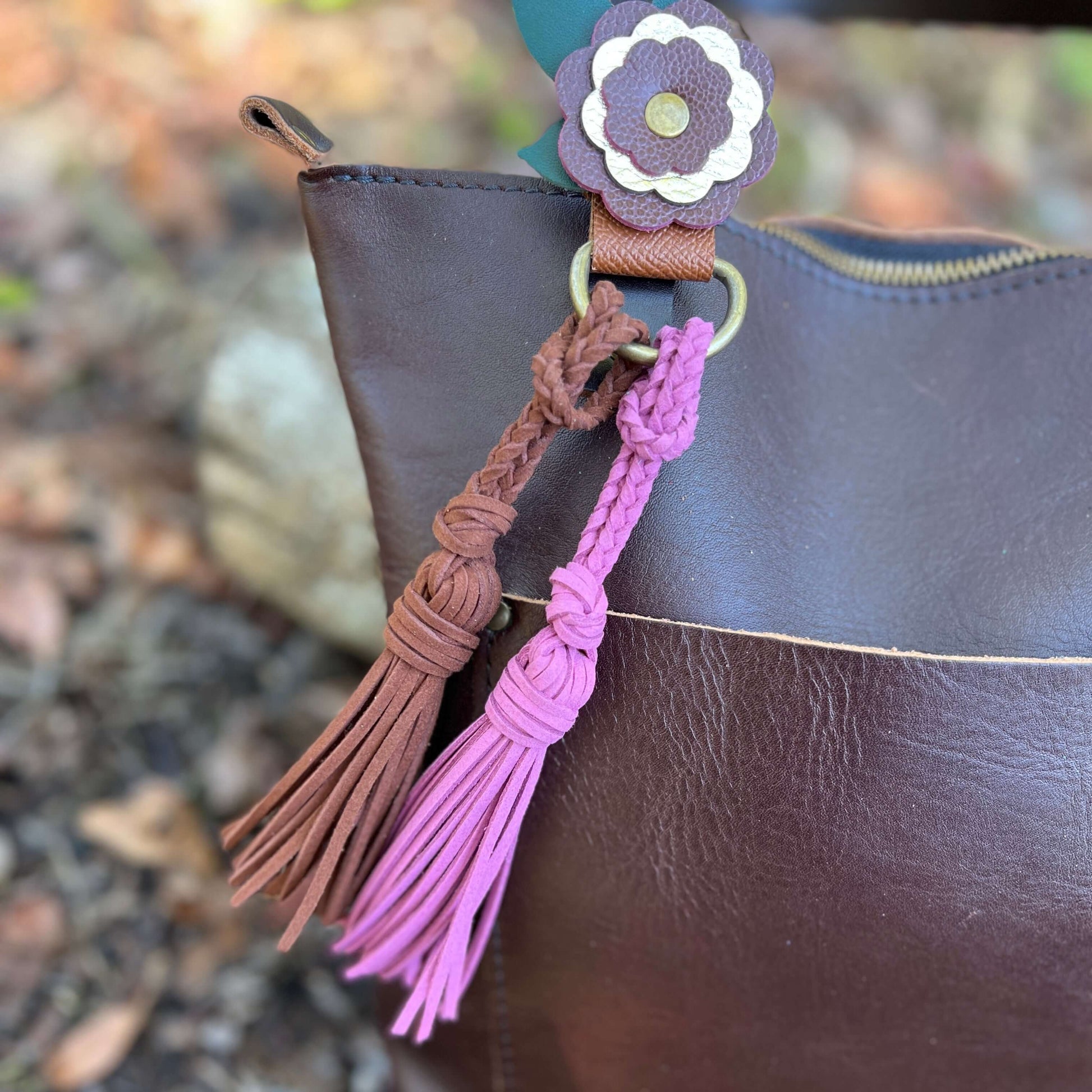 Bag Charm - Mini 4" Tassel for Purses & Totes Faux Suede LeatherJazz up your tote bag, handbag or key chain with a tassel. Lariat style tassels are crafted from faux suede leather so they are stylish and cruelty free. Loop it around your bag strap, purse