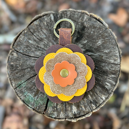 Leather Flower Bag Charm - Brown, Yellow and OrangeLeather flower charms are the perfect way to add a little flair to your handbag, tote or purse. Handcrafted with layers of genuine leather and securely riveted to a leather loop with your choice of hardwa