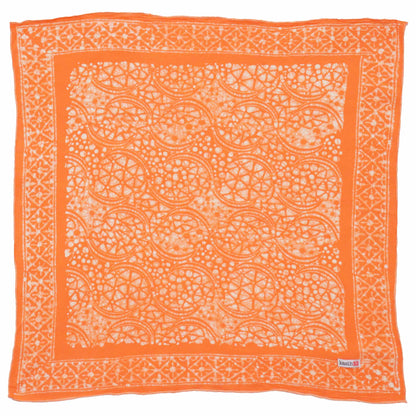 Orange bandana with white paisley pattern on a white background