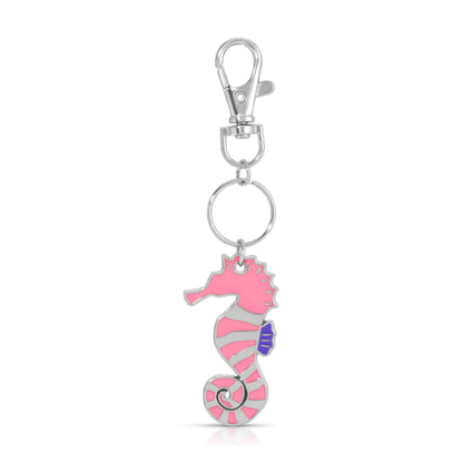 Pink seahorse keychain with a silver clasp on a white background