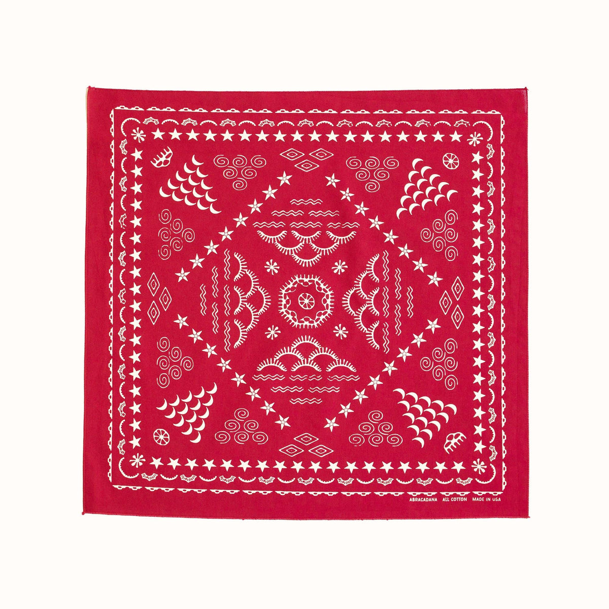 Red bandana with white patterns on a white background