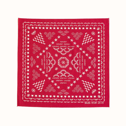 Red bandana with white patterns on a white background