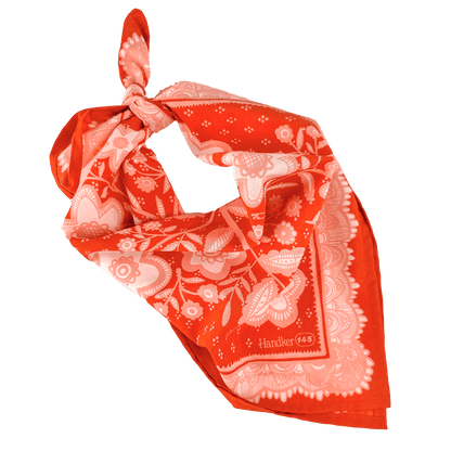 Red floral patterned bandana style scarf on a white background