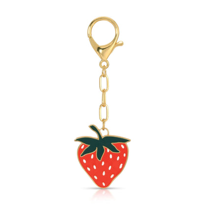 Strawberry-shaped keychain charm with gold clasp on a white background