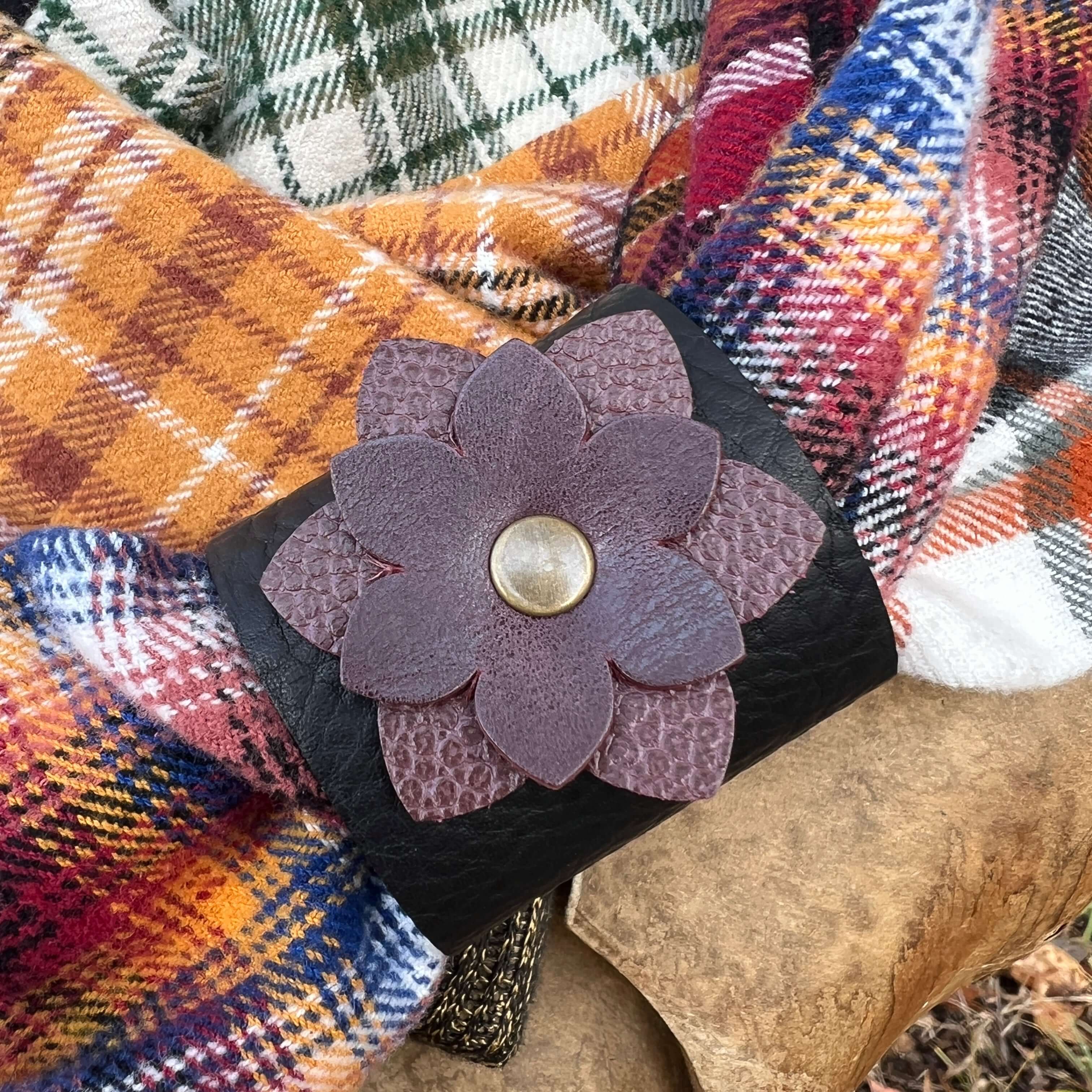 scarf cuff in black and purple leather on plaid scarf