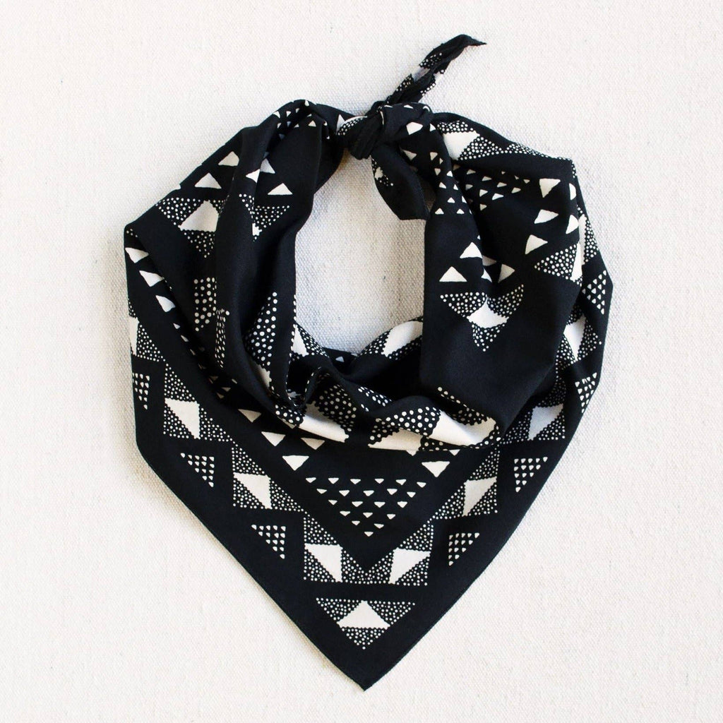 Black bandana with white geometric pattern on a white background