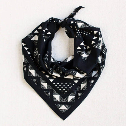 Black bandana with white geometric pattern on a white background