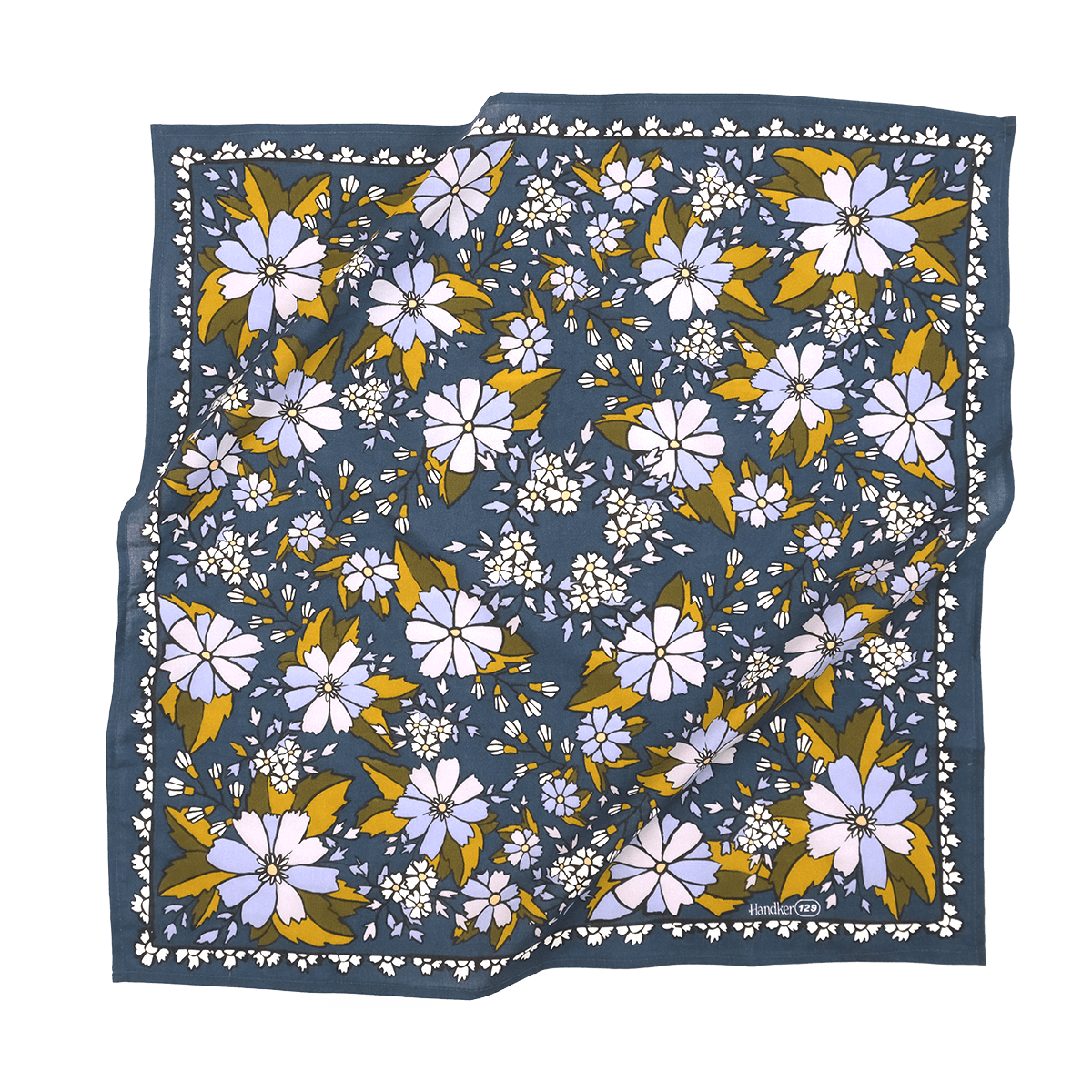 Floral patterned fabric square on a black background