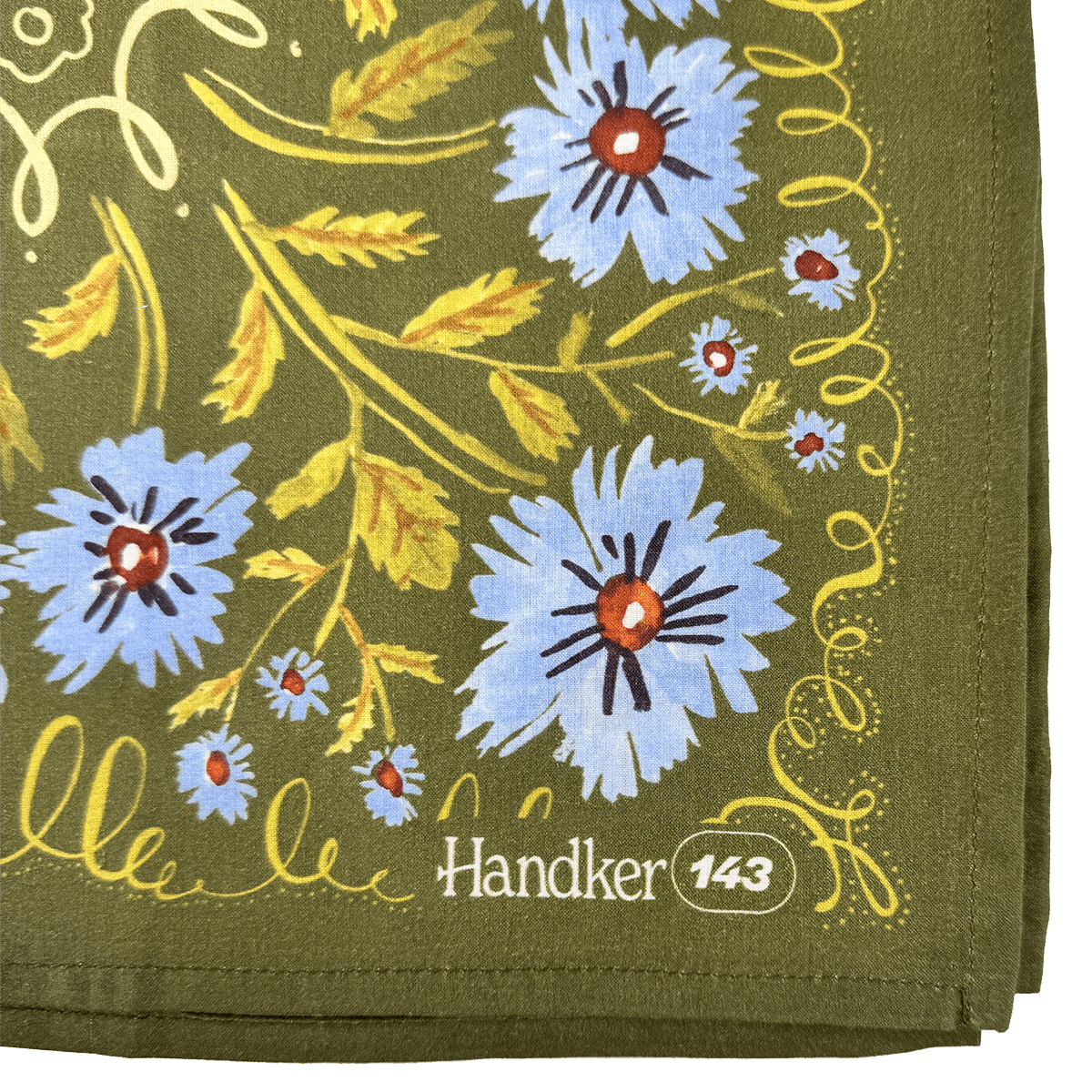 Handkerchief with floral design and 'Handker 143' branding on a green background