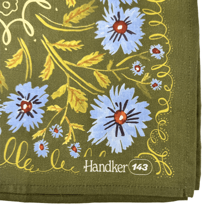 Handkerchief with floral design and 'Handker 143' branding on a green background
