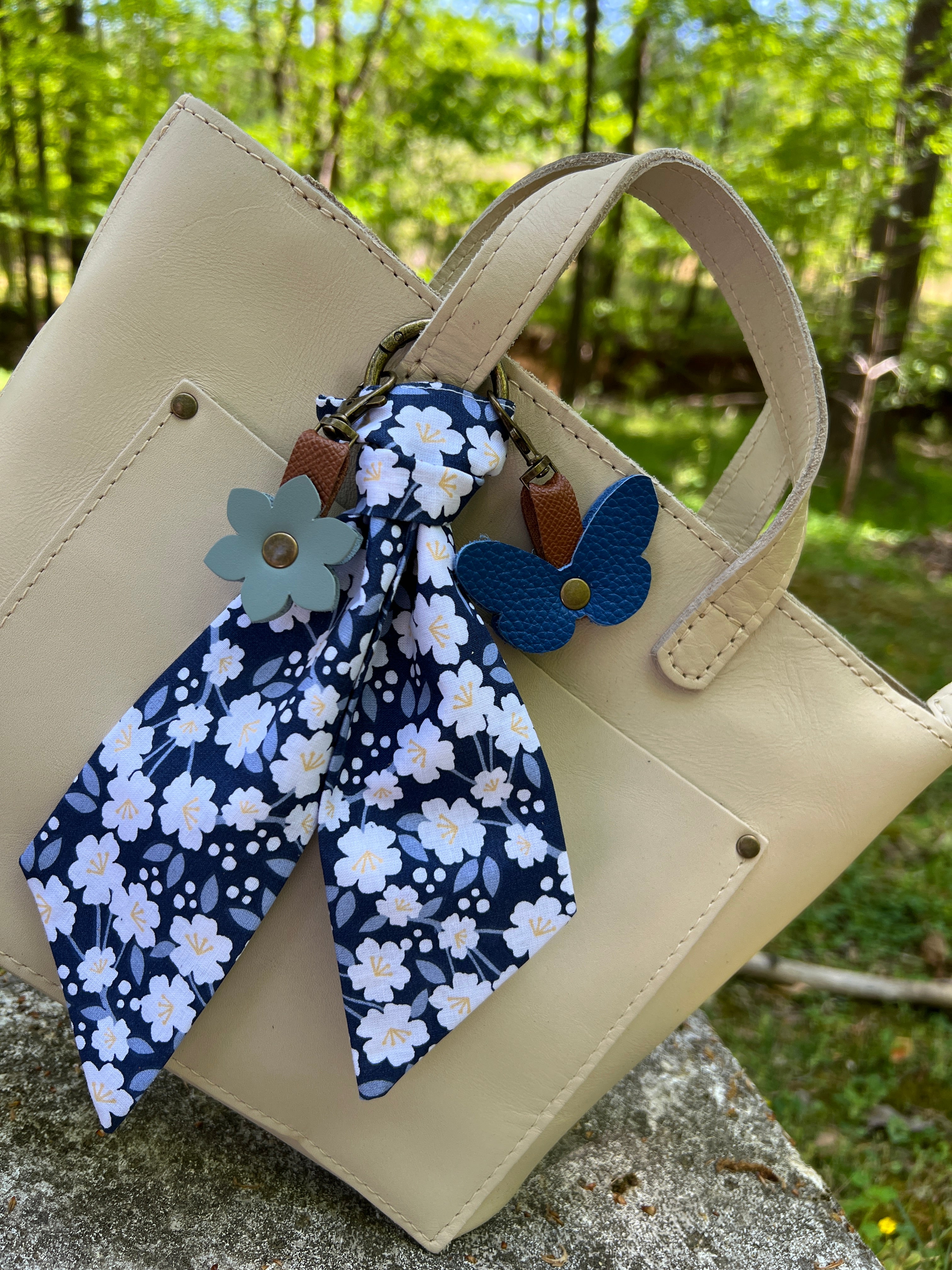 blue flower and butterfly  with floral scarf on white handbag