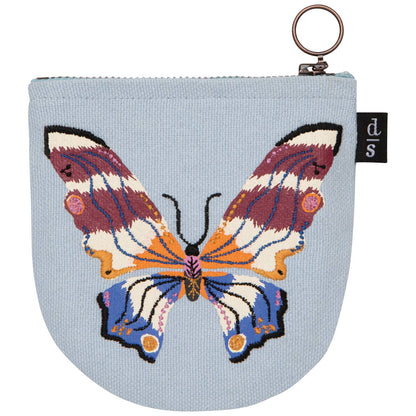 Pouch with a colorful butterfly design on a light blue background