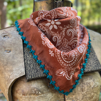 brown and white paisley bandana with blue cotton trim
