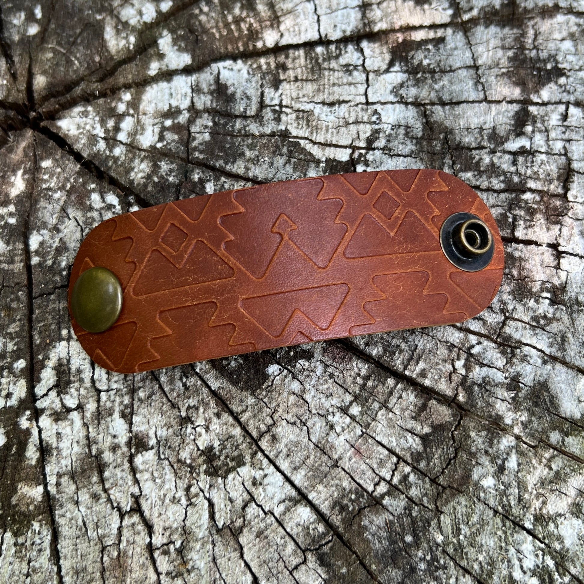 brown leather bandana slide embossed with southwest pattern