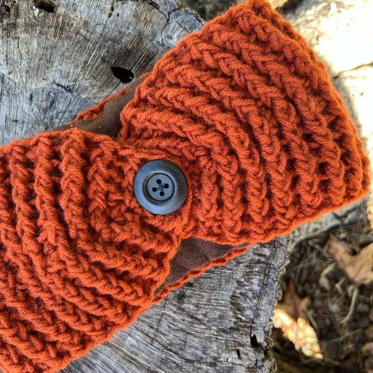 winter headband with fleece lining and button in burnt orange