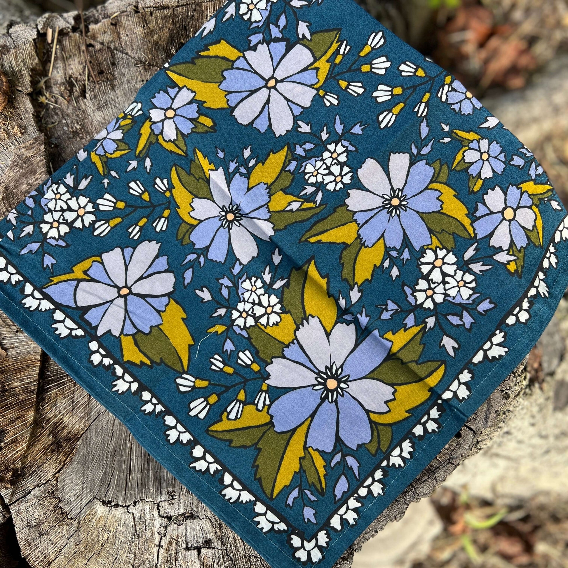 Floral patterned fabric on a wooden surface