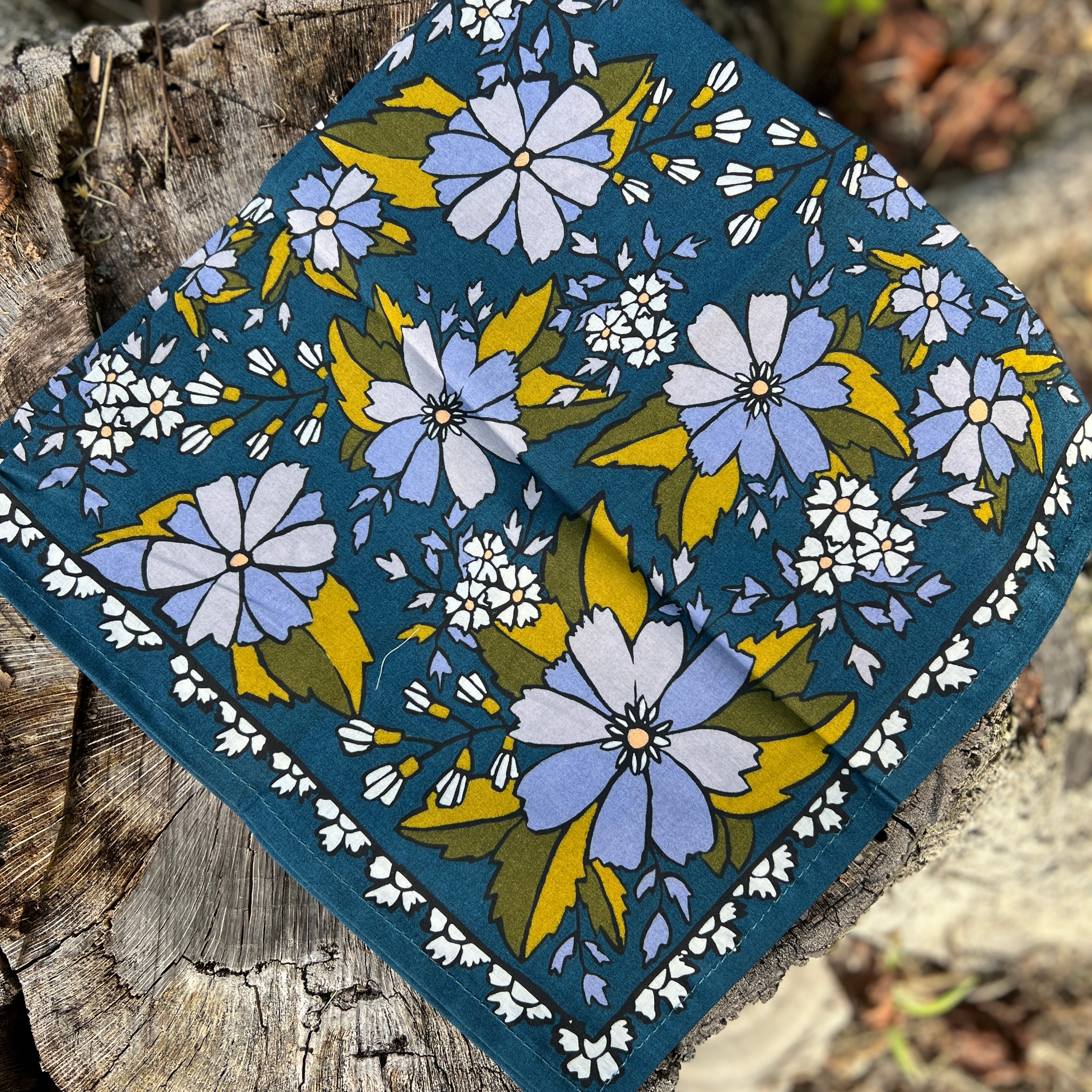 Floral patterned fabric on a wooden surface