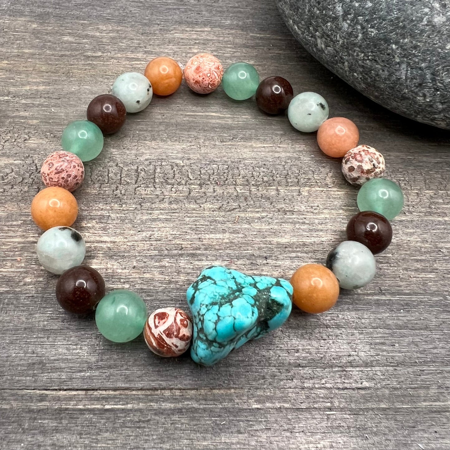colorful natural stone stretch bracelet with blue nugget