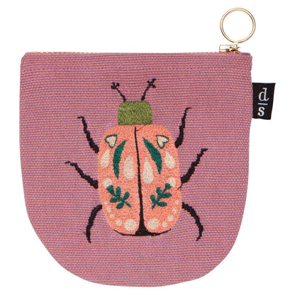 Pink pouch with a beetle design on a white background