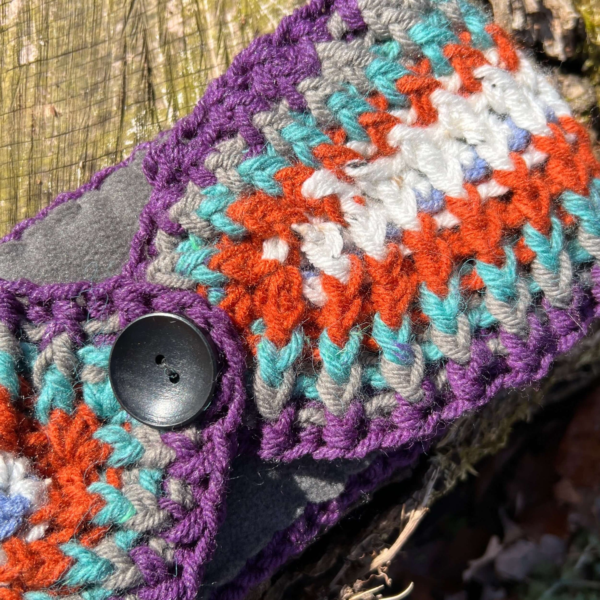 ear warmer with fleece lining in colorful stripes