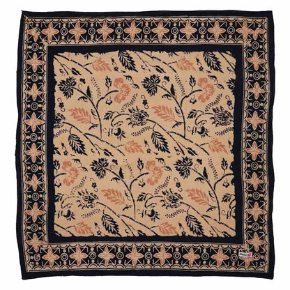 floral batik bandana in navy and brown with leather slide on white background
