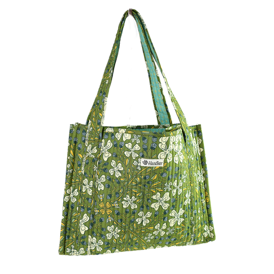 Green floral-patterned tote bag on a white background