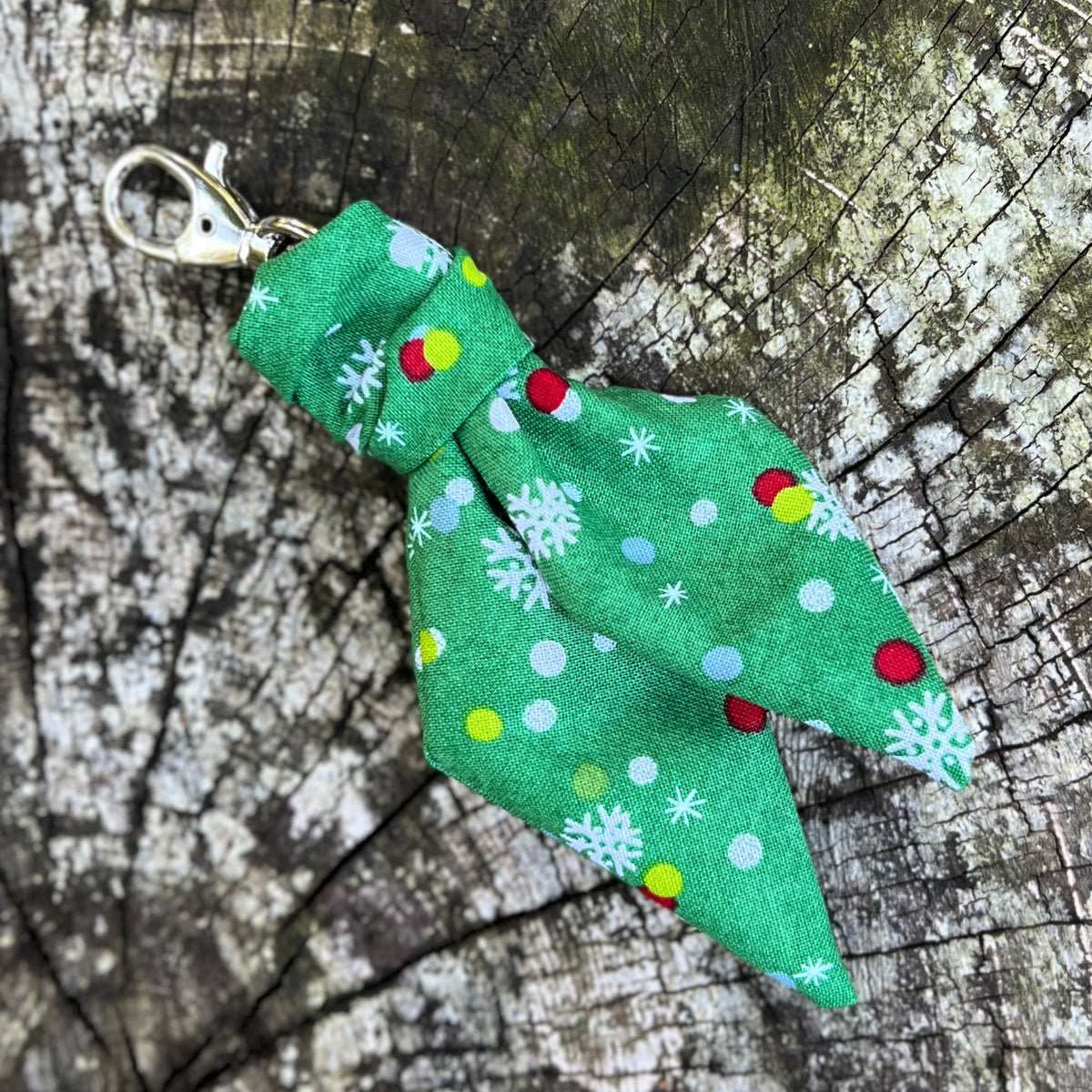 green mini scarf keychain with polka dots and snowflake print