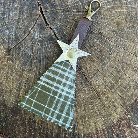 green plaid tree with gold leather star on clip