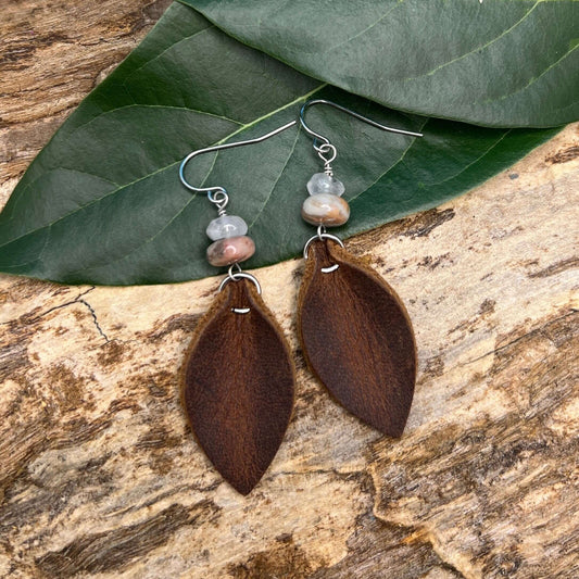 Western Style Leather Earrings - Brown Petal with Quartz and Fossilized CoralA smaller version of one of my best selling styles. Rustic brown leather petal with rose quartz and fossilized coral. - Genuine leather and natural stones - Earrings dangle 2.25"