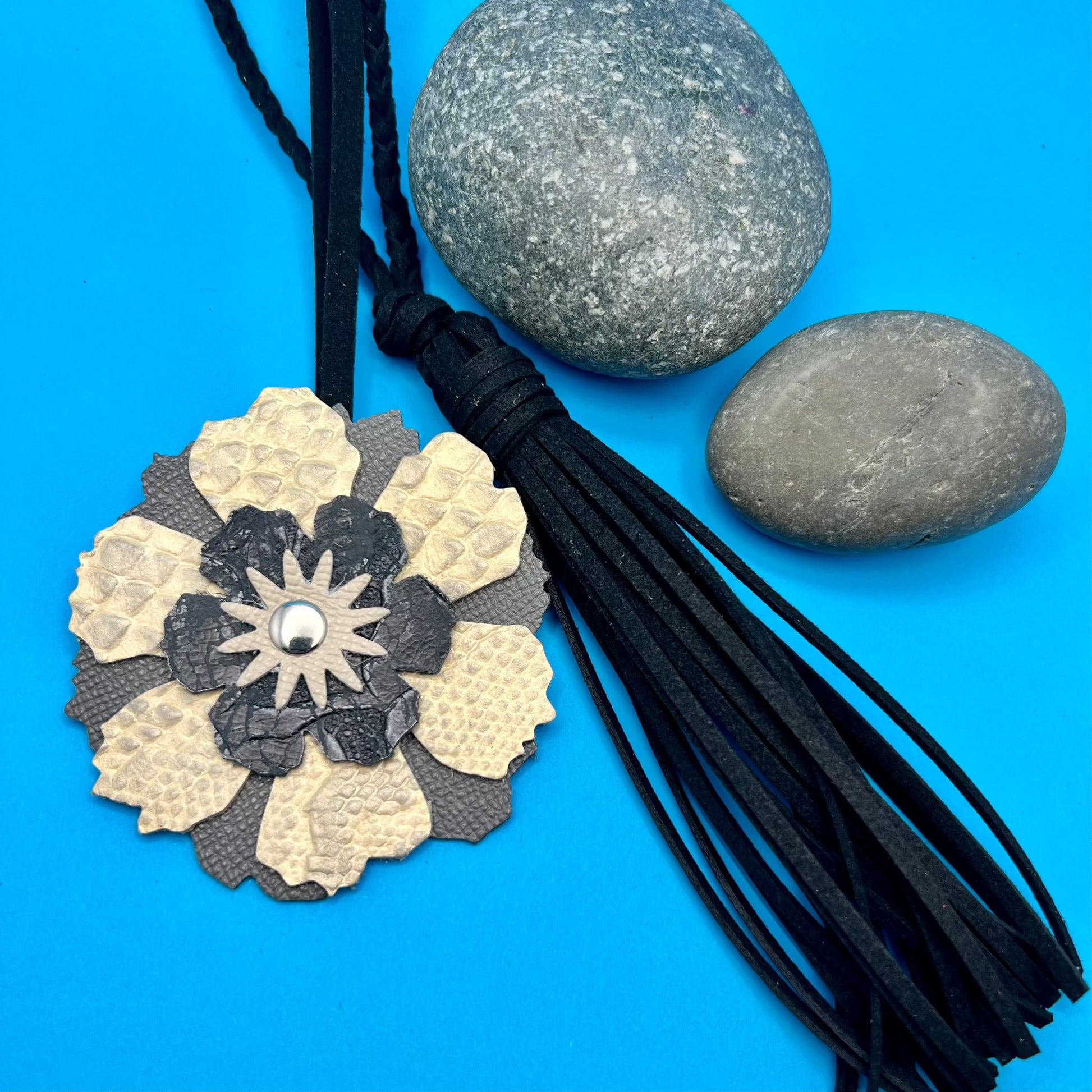 black and gray leather flower and faux suede tasserl bag charm