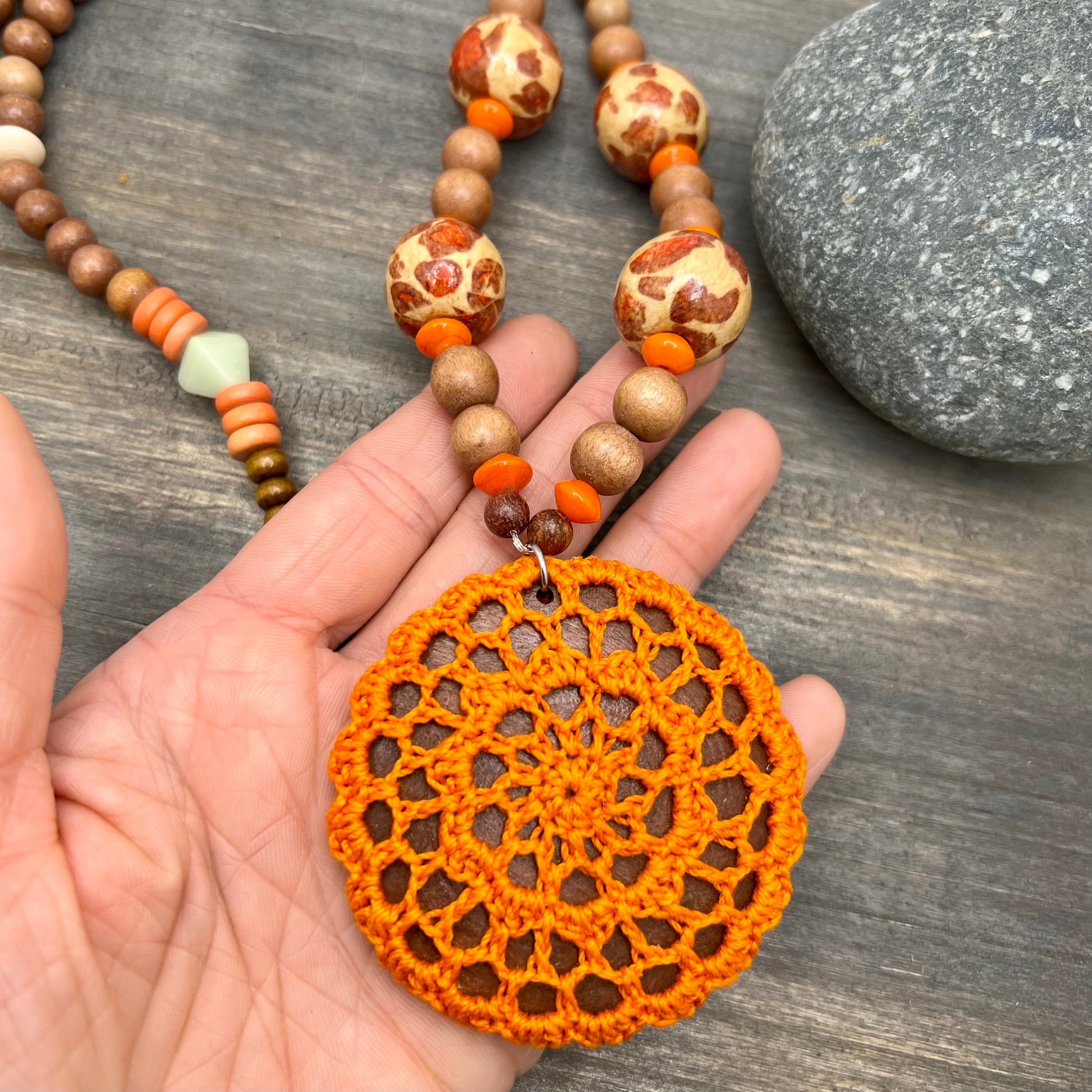 orange crocheted pendant necklace