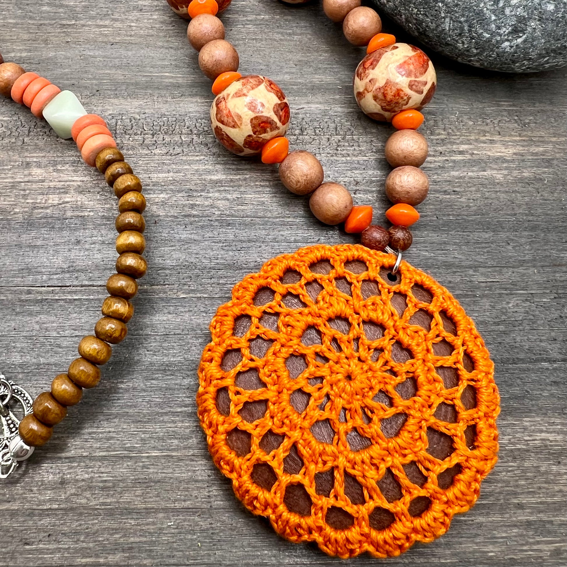 bright orange crocheted pendant necklace