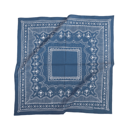 Blue bandana with white intricate patterns on a transparent background