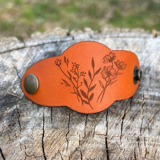leather bandana slide with wildflowers in saddle tan