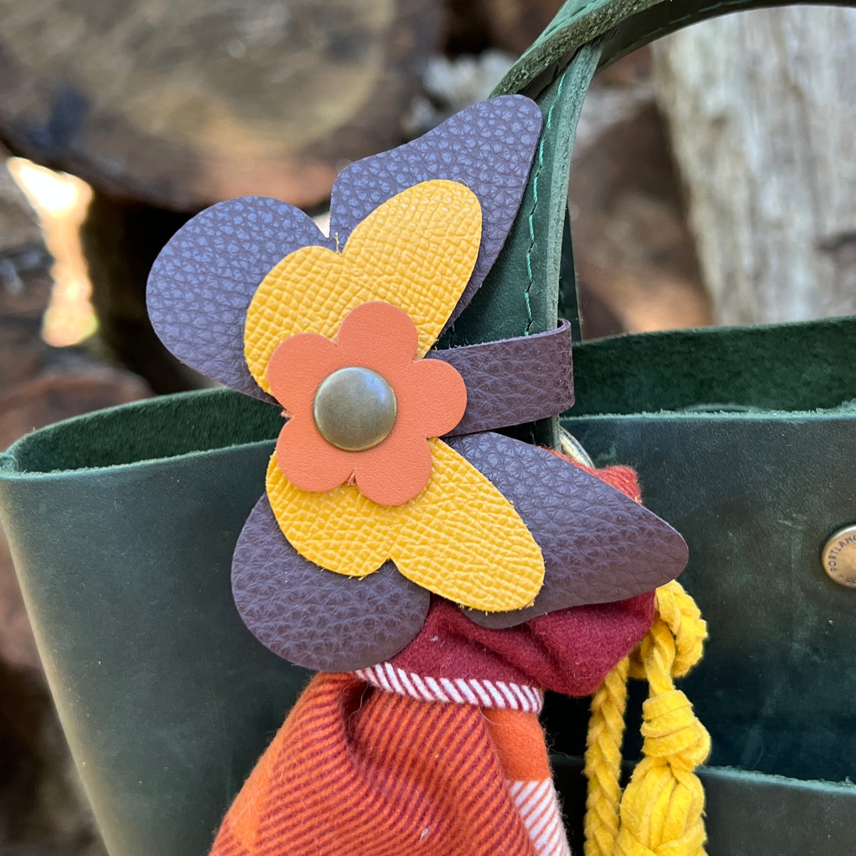 leather butterfly snap on bag charm in burgundy, yellow and orange