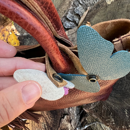 leather butterfly snap on bag charm in teal, orange and purple
