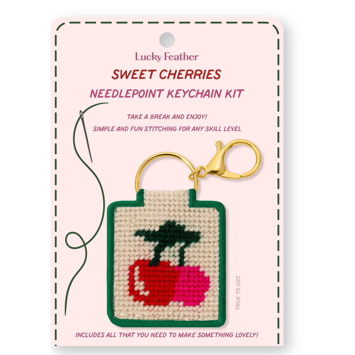 needlepoint keychain kit with cherry on white background