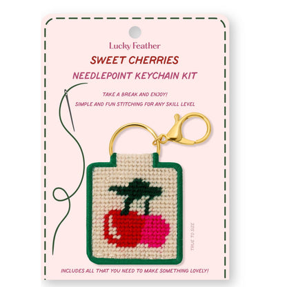 needlepoint keychain kit with cherry on white background