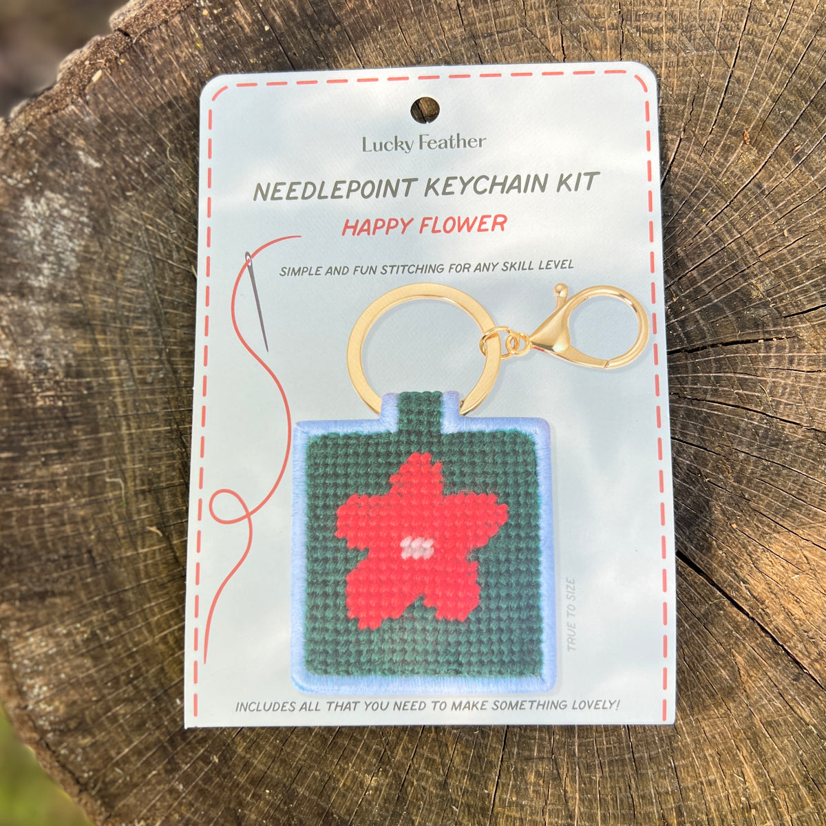 needlepoint keychain kit with happy flower
