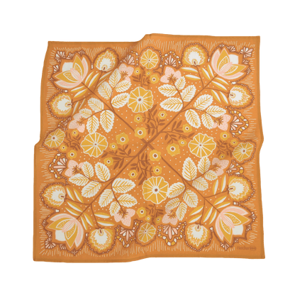 Square scarf with floral pattern on an orange background