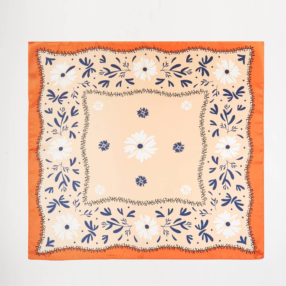 orange floral square scarf on white background