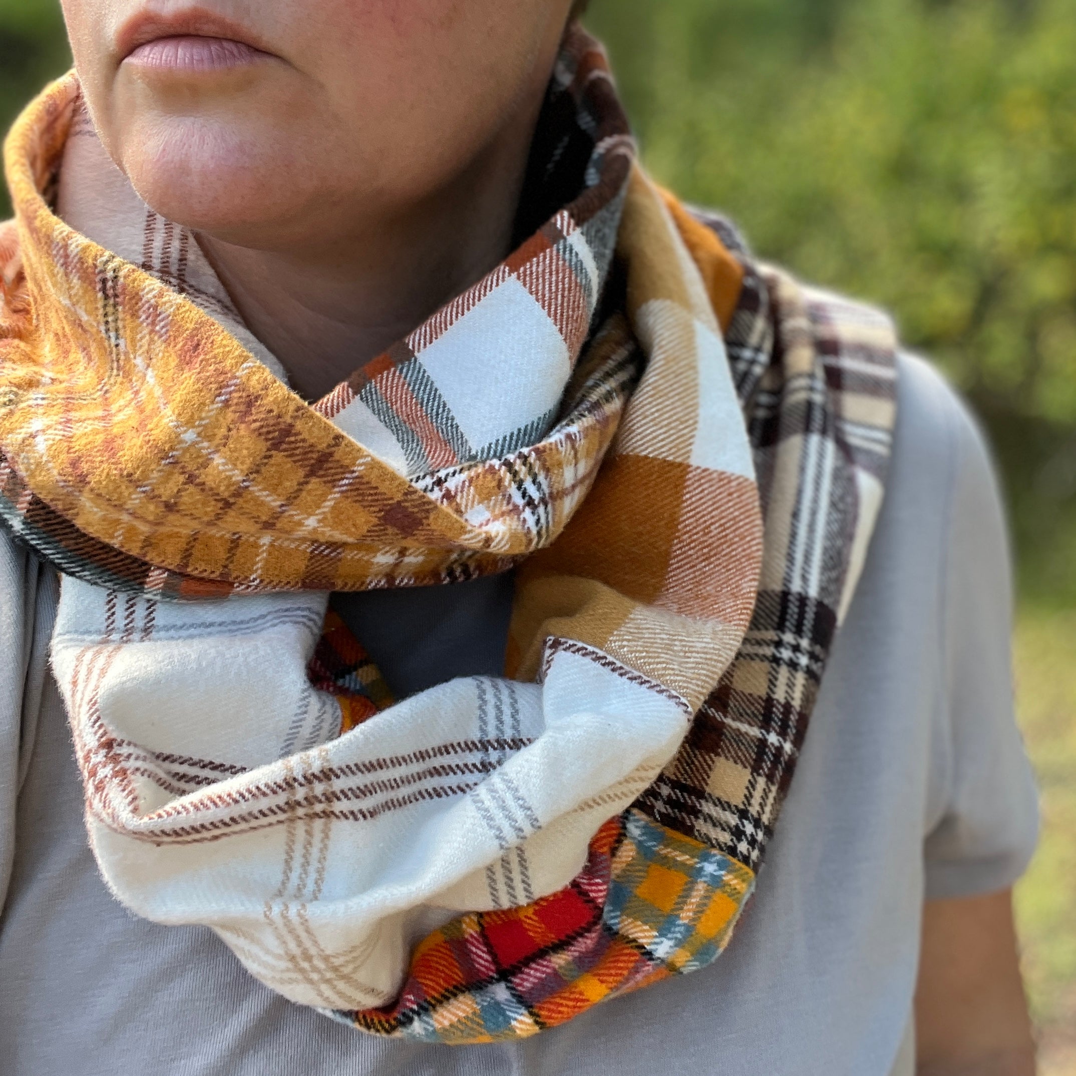 patchwork infinity scarf in orange and brown plaid