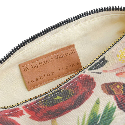 Close-up of a floral pouch with a Bruno Visconti label.