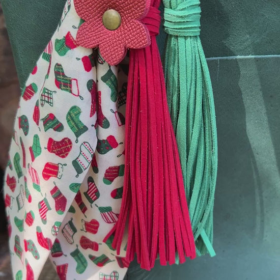 Christmas stocking print purse scarf  red and green tassel and red flower on green tote