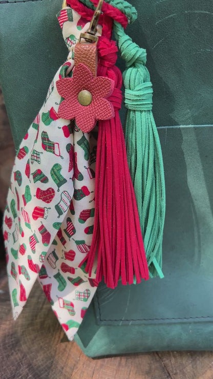 Christmas stocking print purse scarf  red and green tassel and red flower on green tote