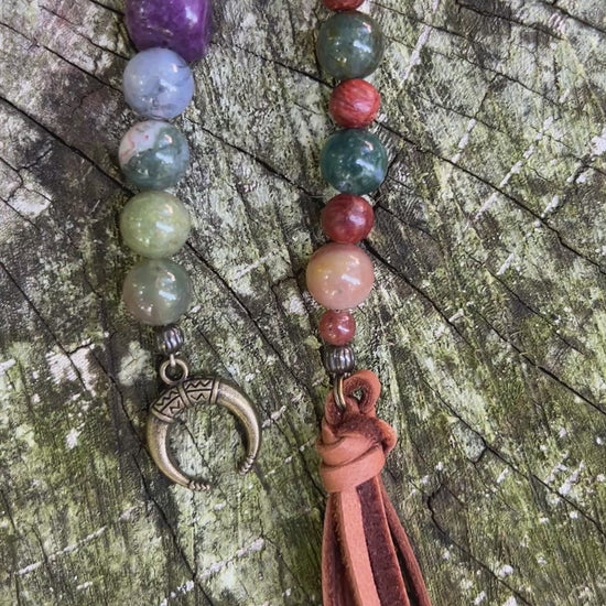 beaded bag charm with leather tassel