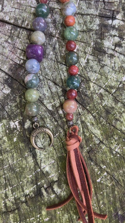 beaded bag charm with leather tassel