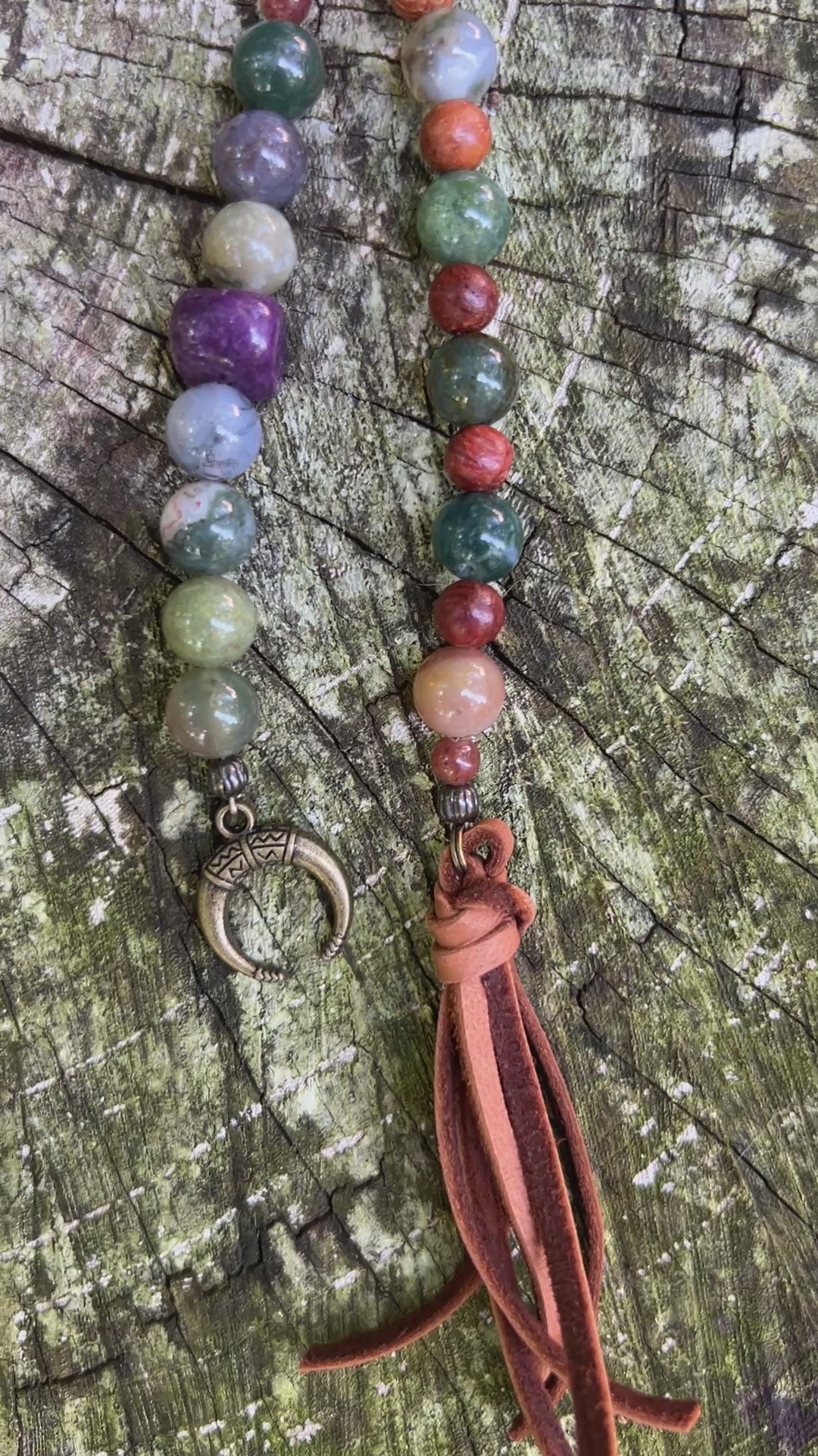 beaded bag charm with leather tassel